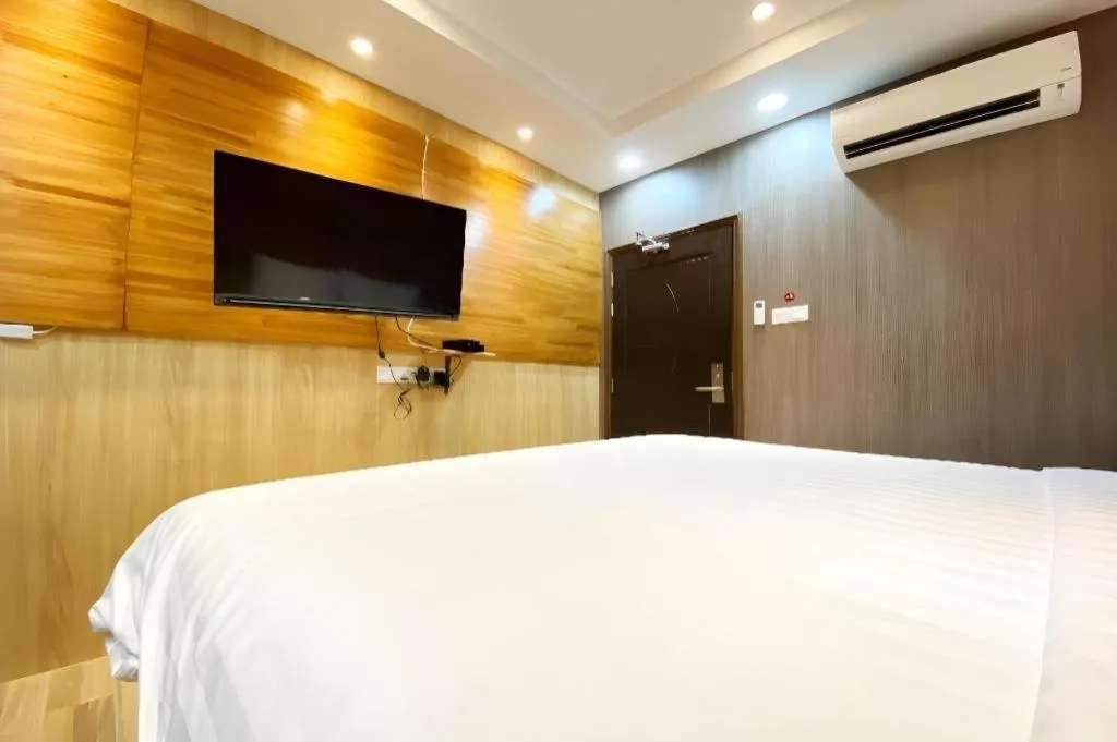 Bed in OYO 90262 Kota Kinabalu Homestay, Villa & Suite Boutique