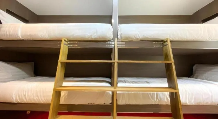 Bed in OYO 90262 Kota Kinabalu Homestay, Villa & Suite Boutique