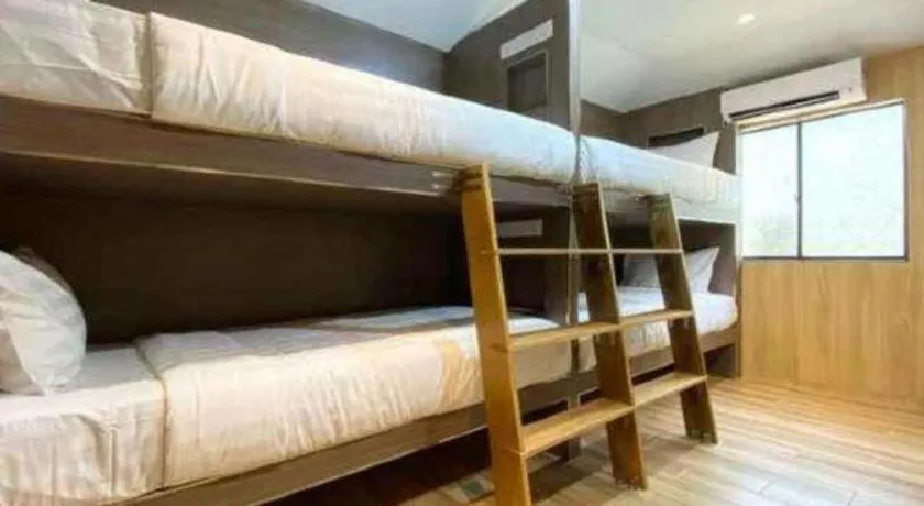 Bed in OYO 90262 Kota Kinabalu Homestay, Villa & Suite Boutique