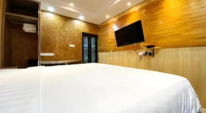 Bed in OYO 90262 Kota Kinabalu Homestay, Villa & Suite Boutique