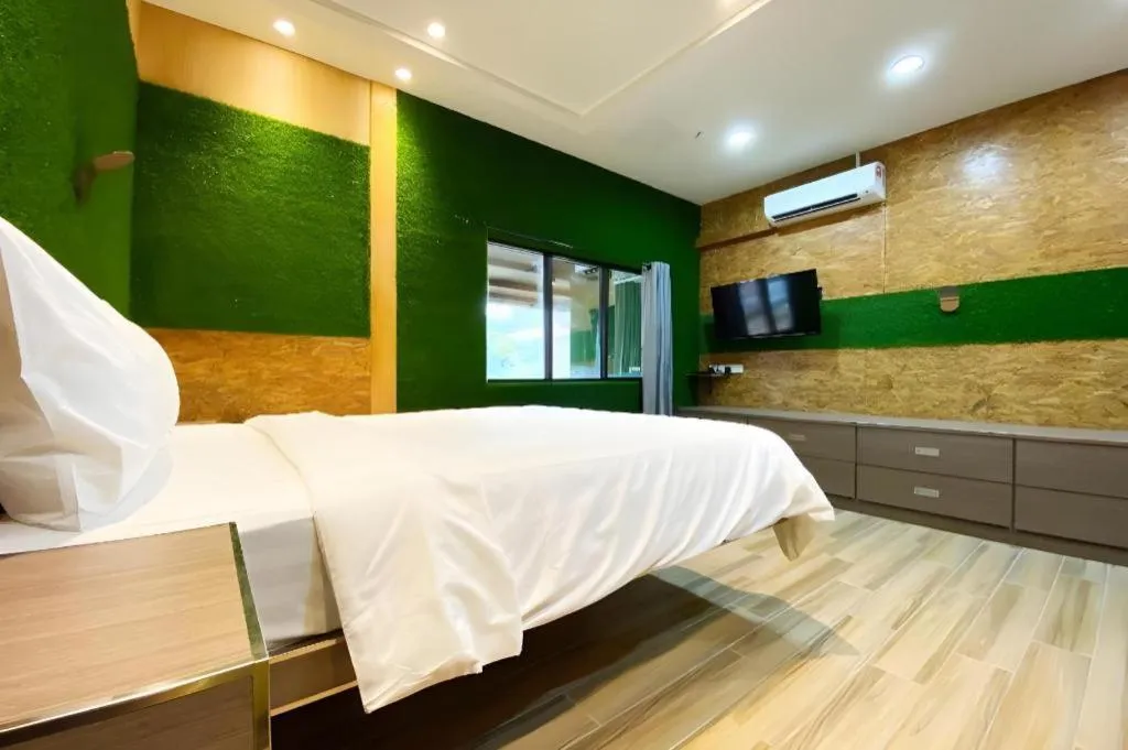 Bed in OYO 90262 Kota Kinabalu Homestay, Villa & Suite Boutique