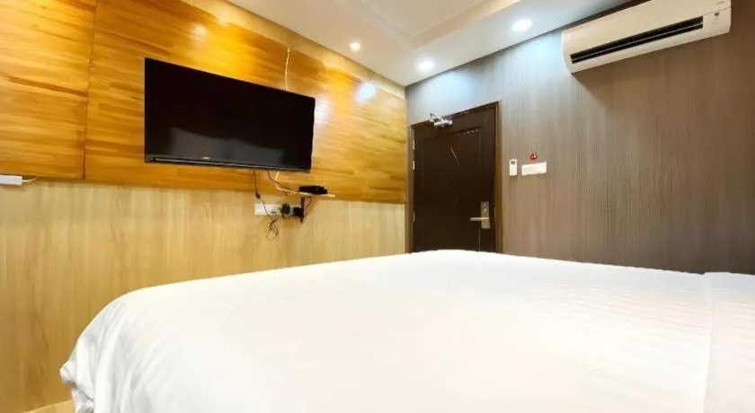 Bed in OYO 90262 Kota Kinabalu Homestay, Villa & Suite Boutique