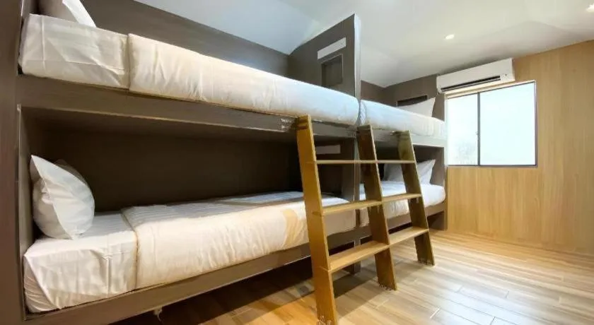 Bed in OYO 90262 Kota Kinabalu Homestay, Villa & Suite Boutique