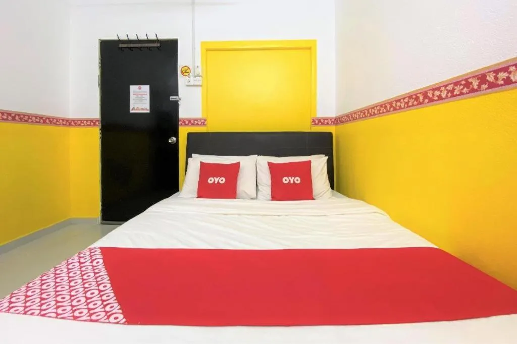 Bed in OYO 90176 D'cruz Sunrise Villa