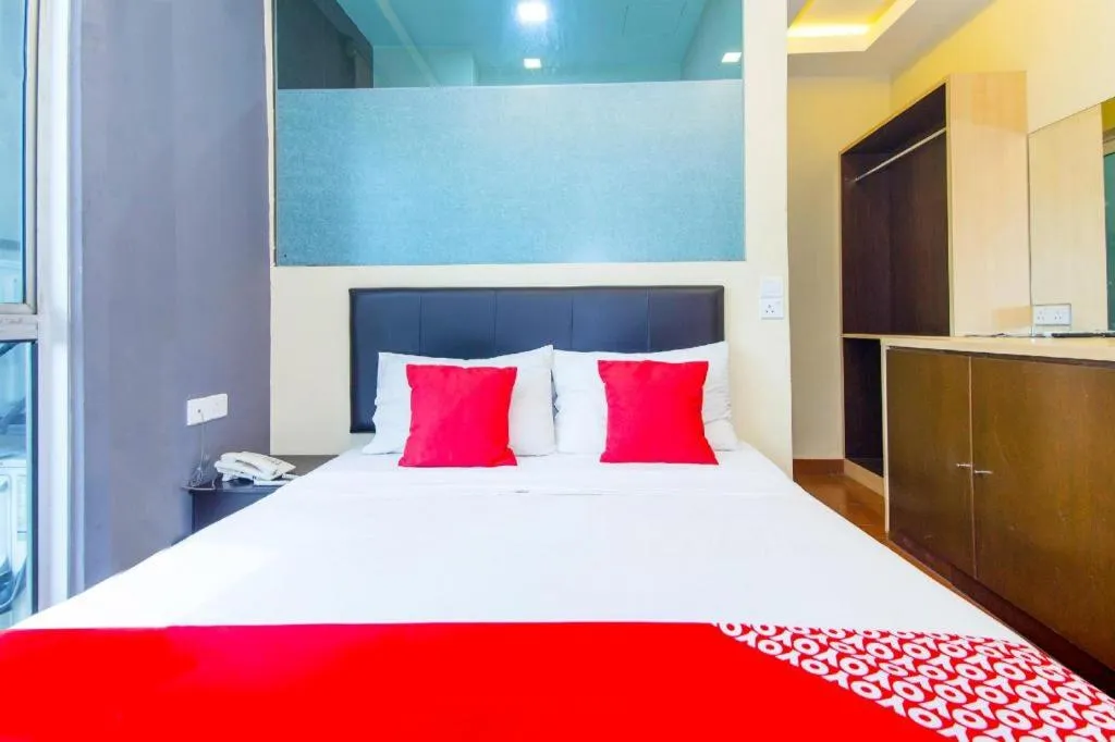 Bed in OYO 90429 Hotel Narasindo