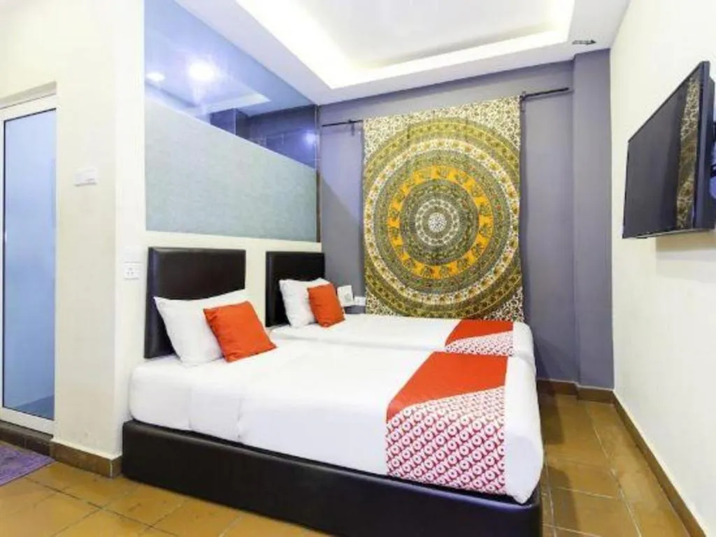 Bed in OYO 90429 Hotel Narasindo