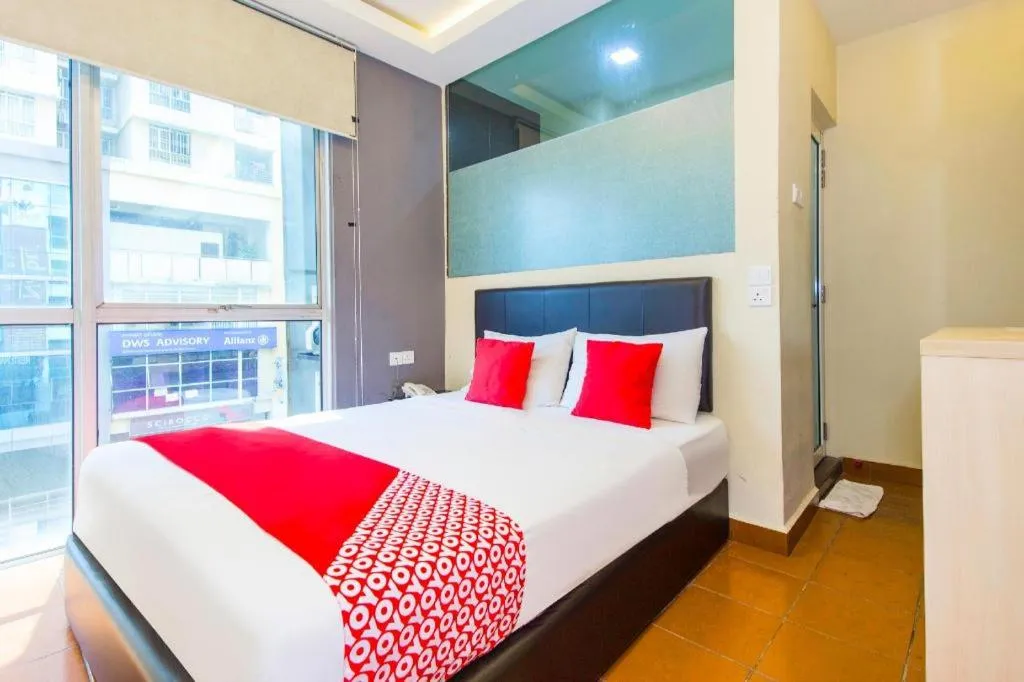 Bed in OYO 90429 Hotel Narasindo