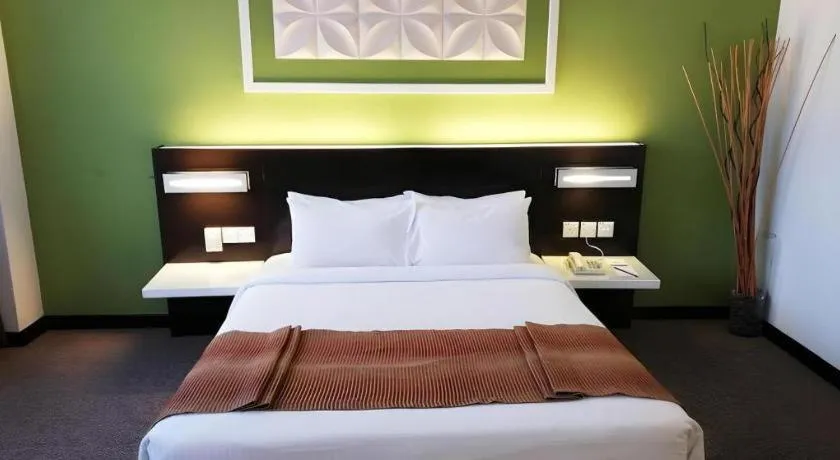 Bed in Grand Barakah Hotel