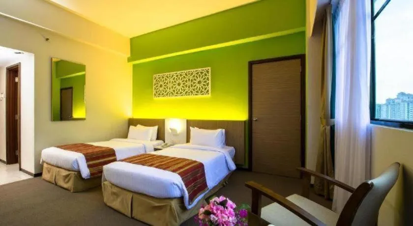 Bed in Grand Barakah Hotel