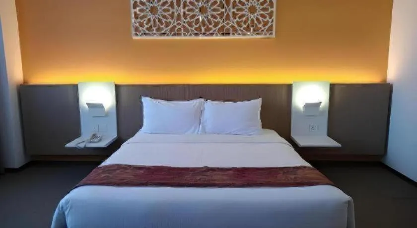 Bed in Grand Barakah Hotel