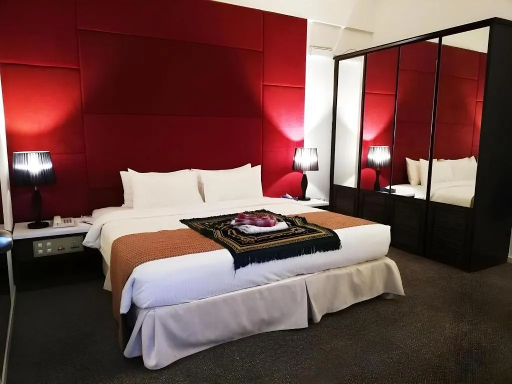 Bed in Grand Barakah Hotel