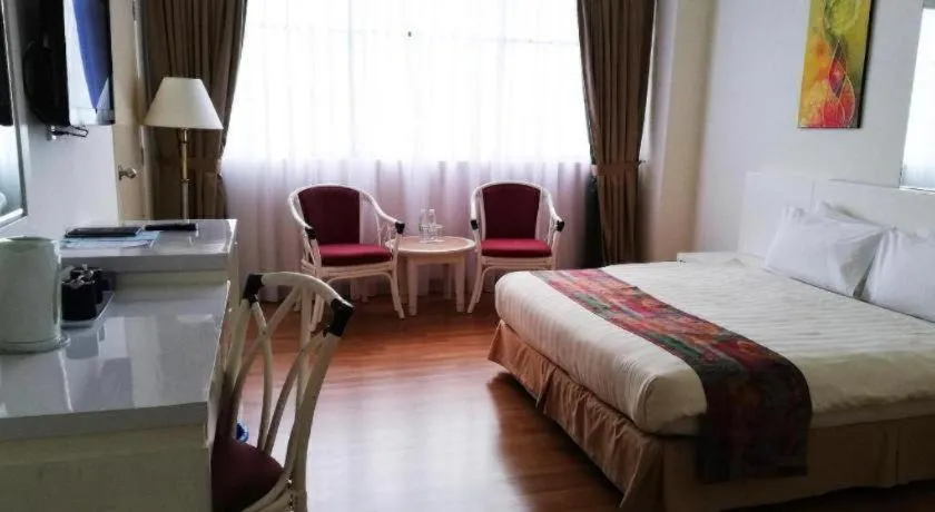 Bed in Grand Barakah Hotel