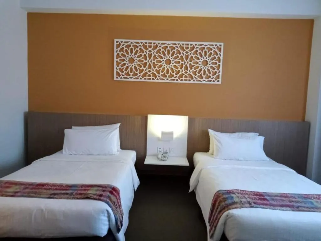 Bed in Grand Barakah Hotel