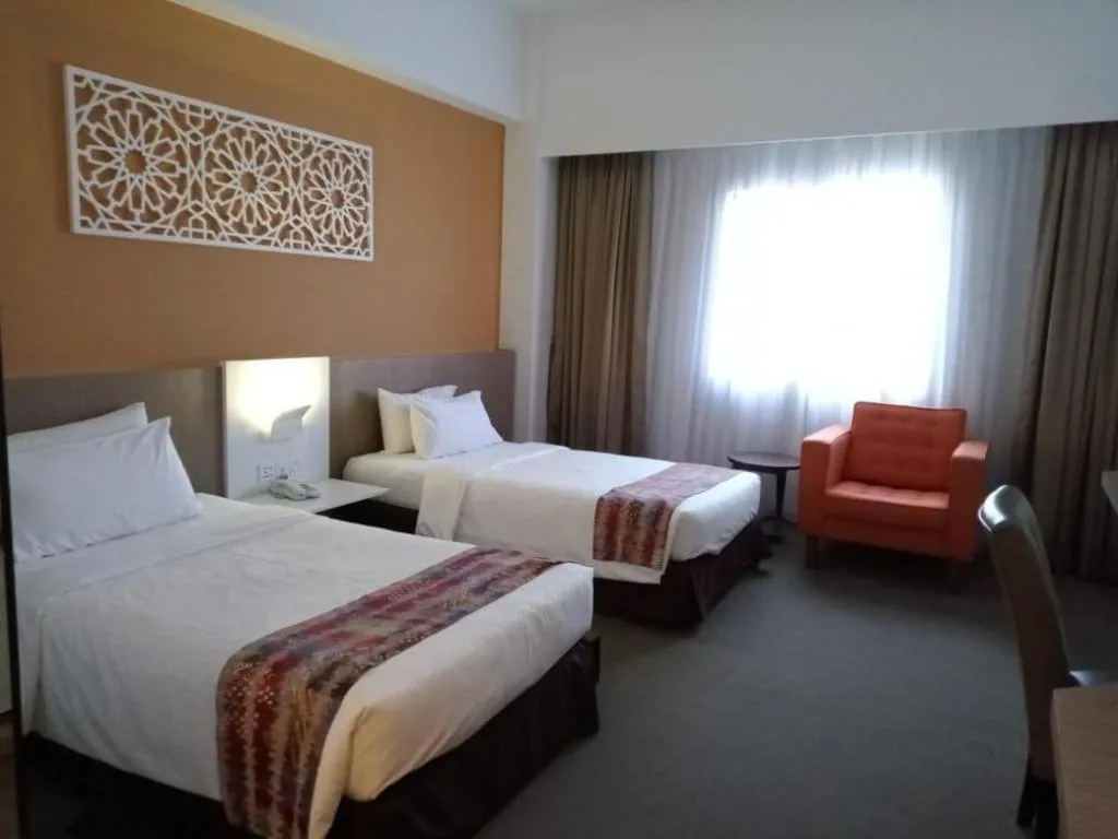 Bed in Grand Barakah Hotel