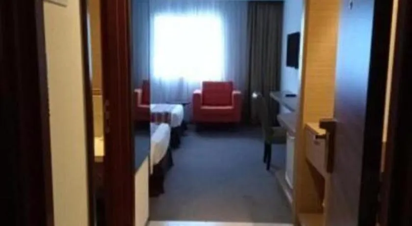 Bed in Grand Barakah Hotel