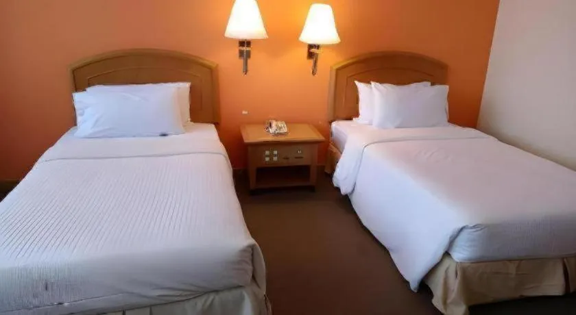 Bed in Grand Barakah Hotel