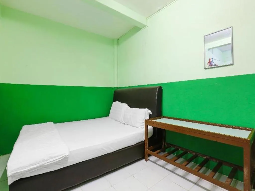 Bed in OYO 90623 Thank Q Inn 3