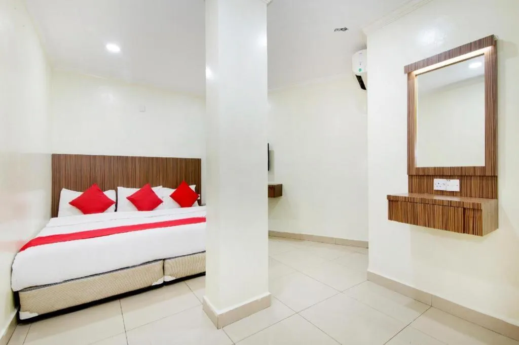 Bed in OYO 90623 Thank Q Inn 3