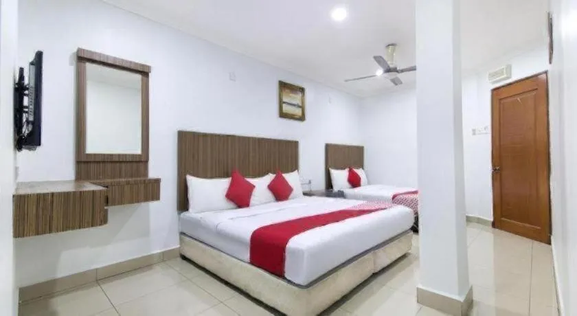 Bed in OYO 90623 Thank Q Inn 3