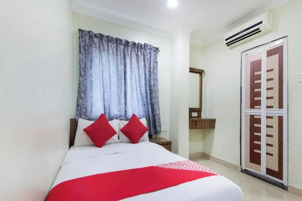 Bed in OYO 90623 Thank Q Inn 3