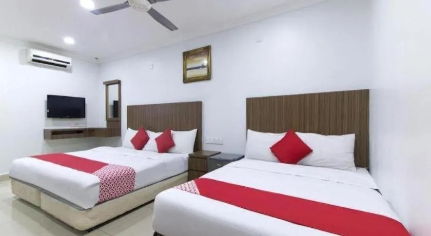 Bed in OYO 90623 Thank Q Inn 3