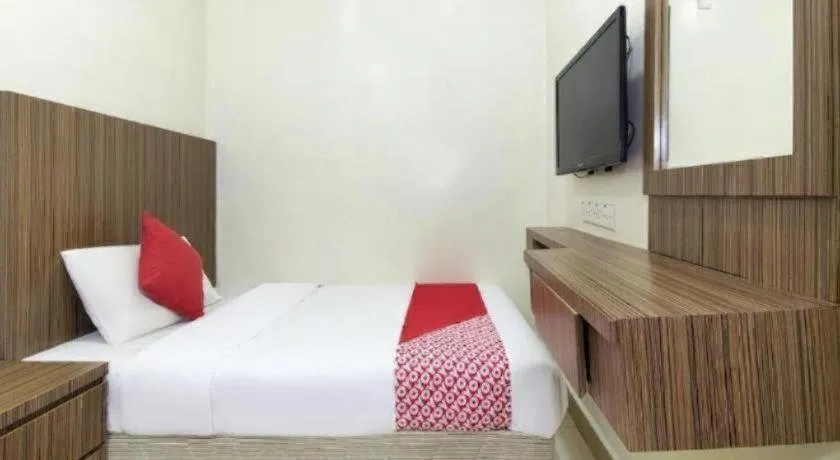 Bed in OYO 90623 Thank Q Inn 3
