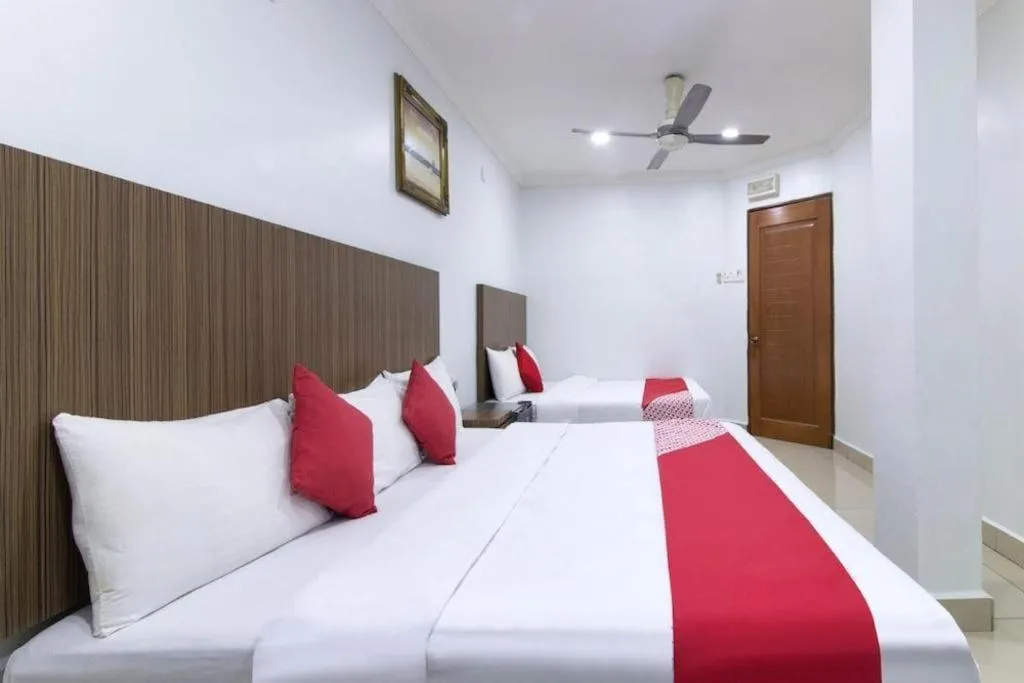 Bed in OYO 90623 Thank Q Inn 3