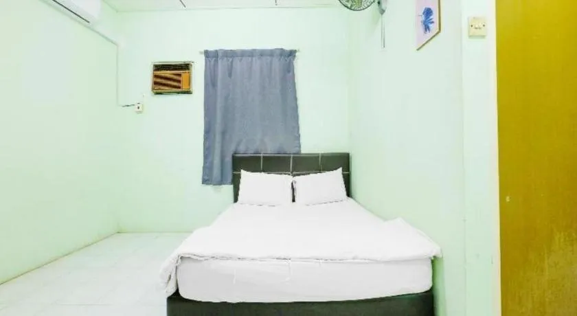 Bed in OYO 90623 Thank Q Inn 3