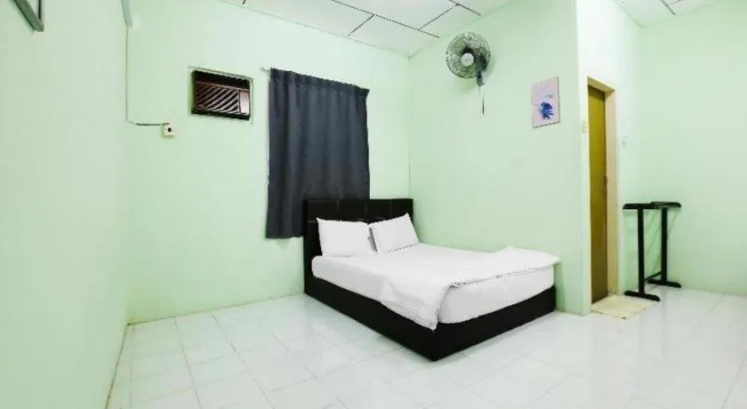 Bed in OYO 90623 Thank Q Inn 3