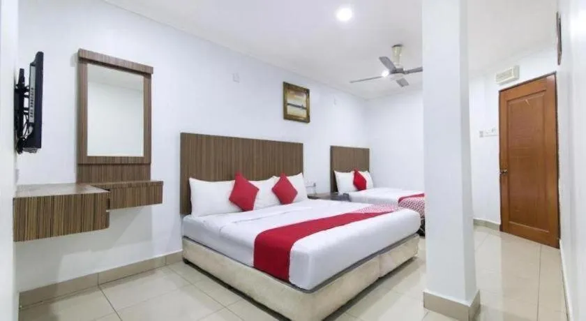 Bed in OYO 90623 Thank Q Inn 3