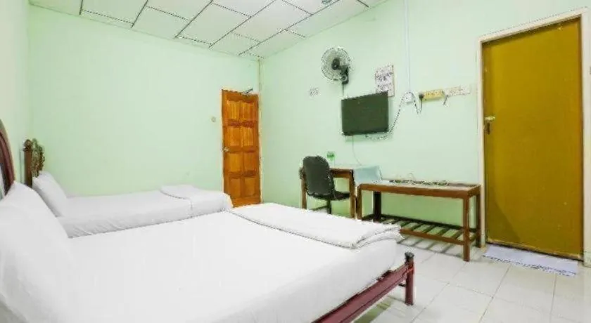 Bed in OYO 90623 Thank Q Inn 3