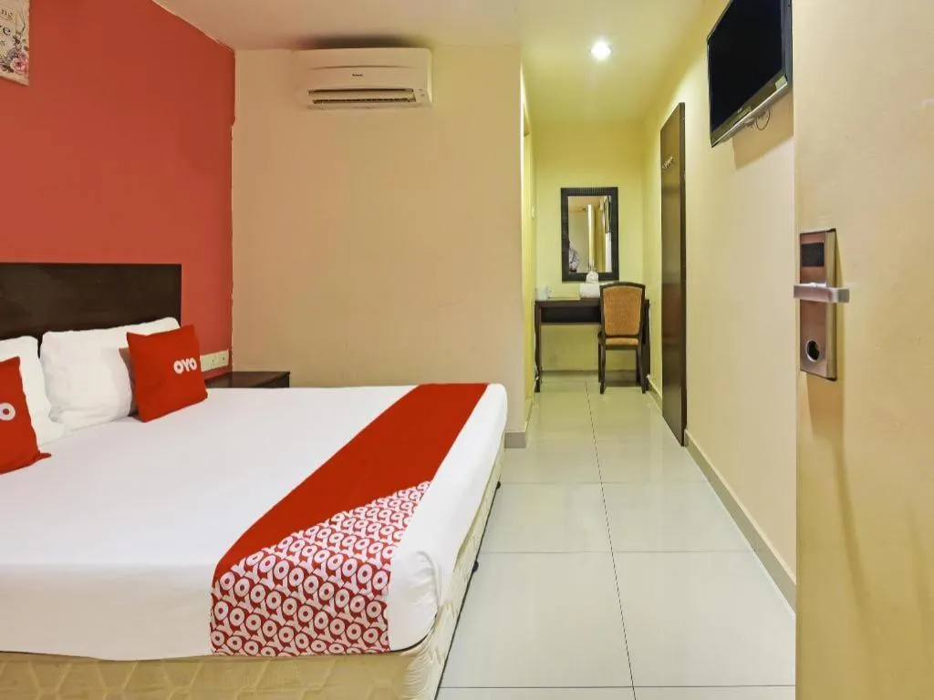 Bed in OYO 90669 My Hotel Vistana