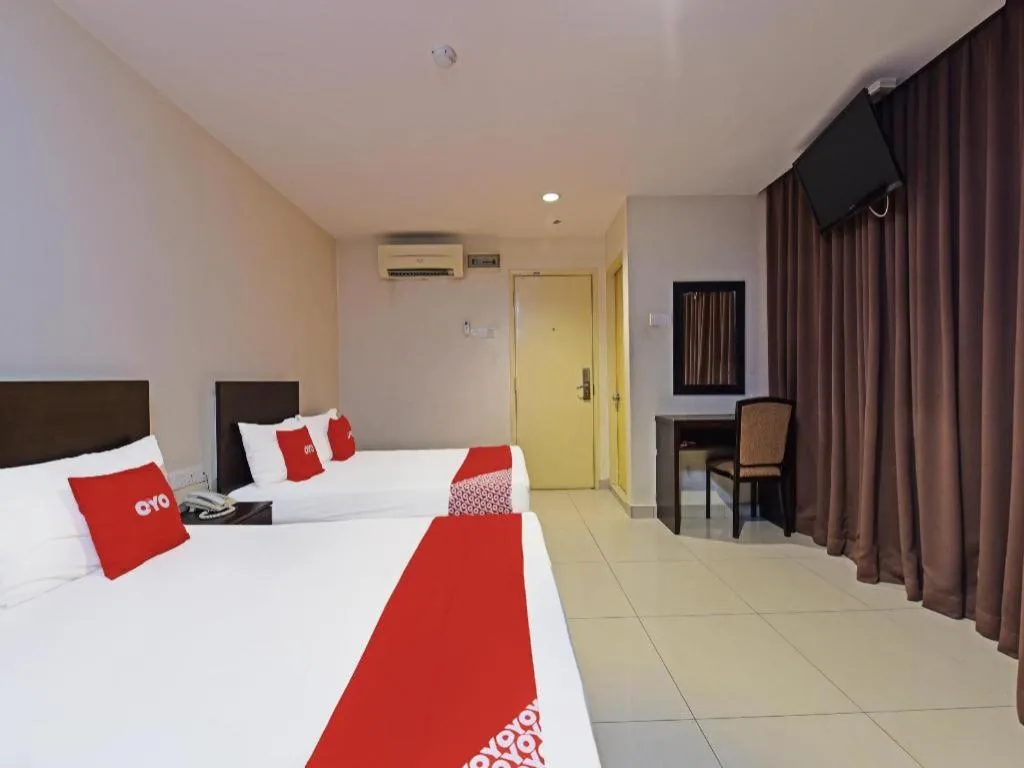 Bed in OYO 90669 My Hotel Vistana