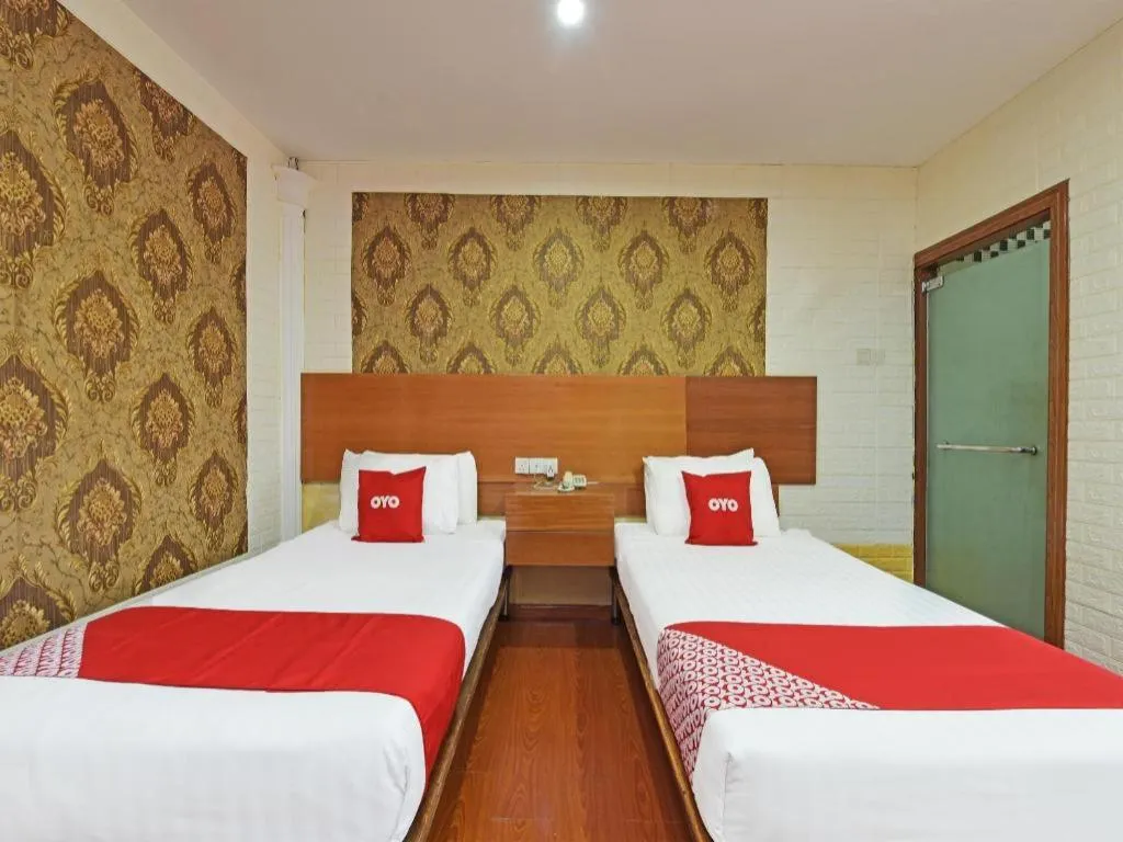 Bed in Capital O 90661 Luxor Empire Hotel