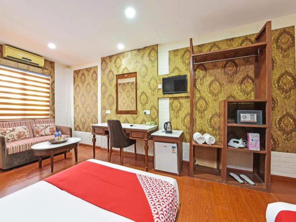 Bed in Capital O 90661 Luxor Empire Hotel