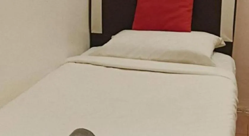 Bed in The Hotel Tudor Inn