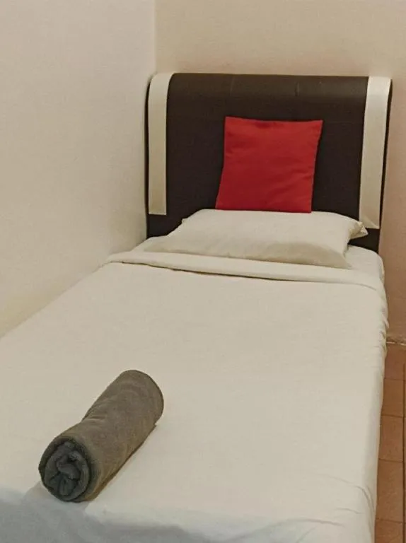 Bed in The Hotel Tudor Inn