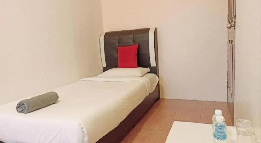 Bed in The Hotel Tudor Inn