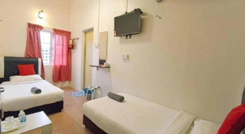 Bed in The Hotel Tudor Inn