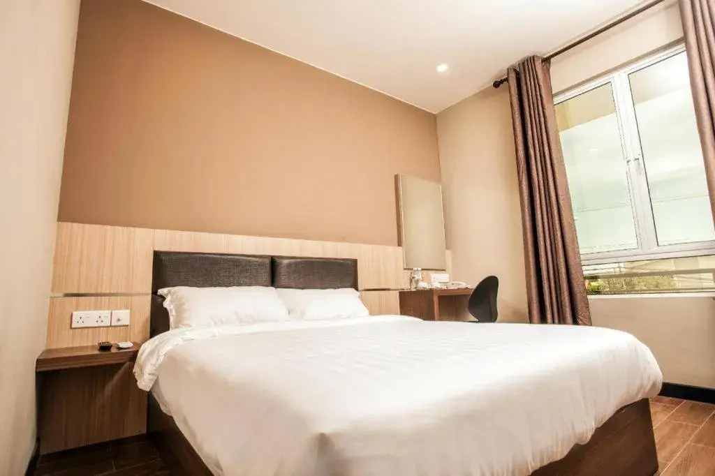 Bed in Friendly Hotel Bed in Friendly Hotel