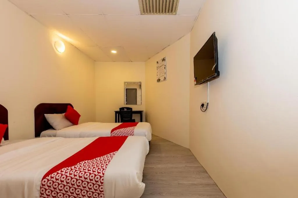 Bed in OYO 90893 Hotel 68 Kampung Lapan