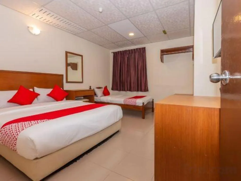 Bed in OYO 90893 Hotel 68 Kampung Lapan