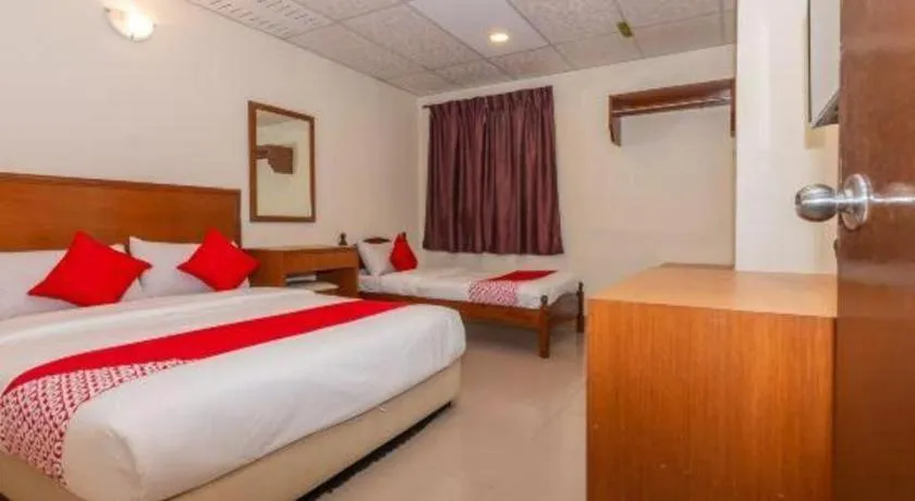 Bed in OYO 90893 Hotel 68 Kampung Lapan