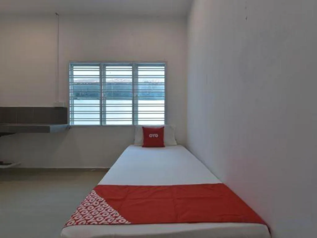 Bed in OYO 90889 Narasindo Cottage