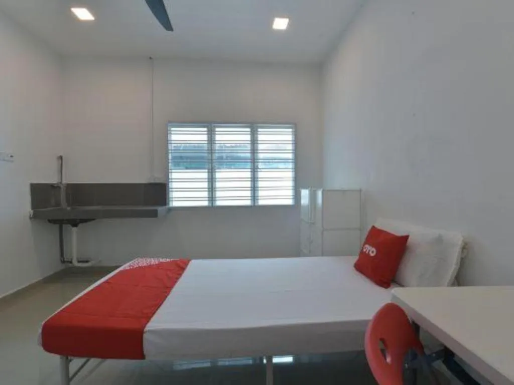 Bed in OYO 90889 Narasindo Cottage