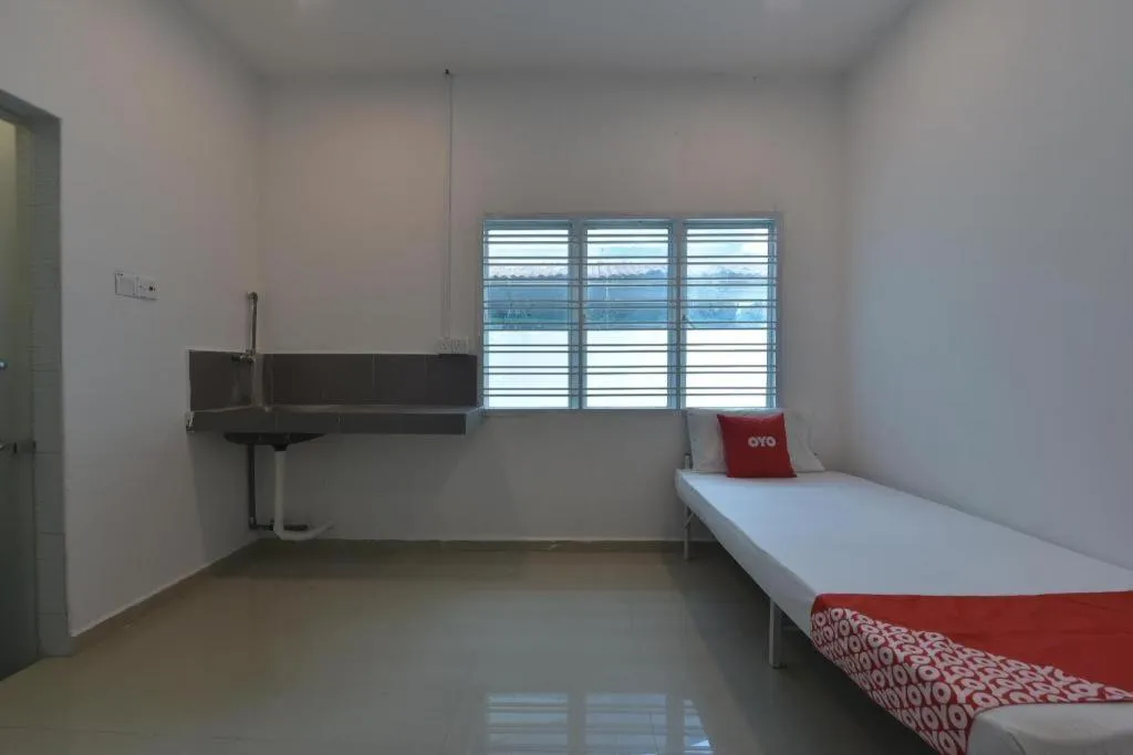 Bed in OYO 90889 Narasindo Cottage