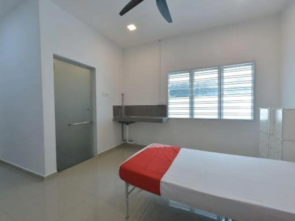 Bed in OYO 90889 Narasindo Cottage