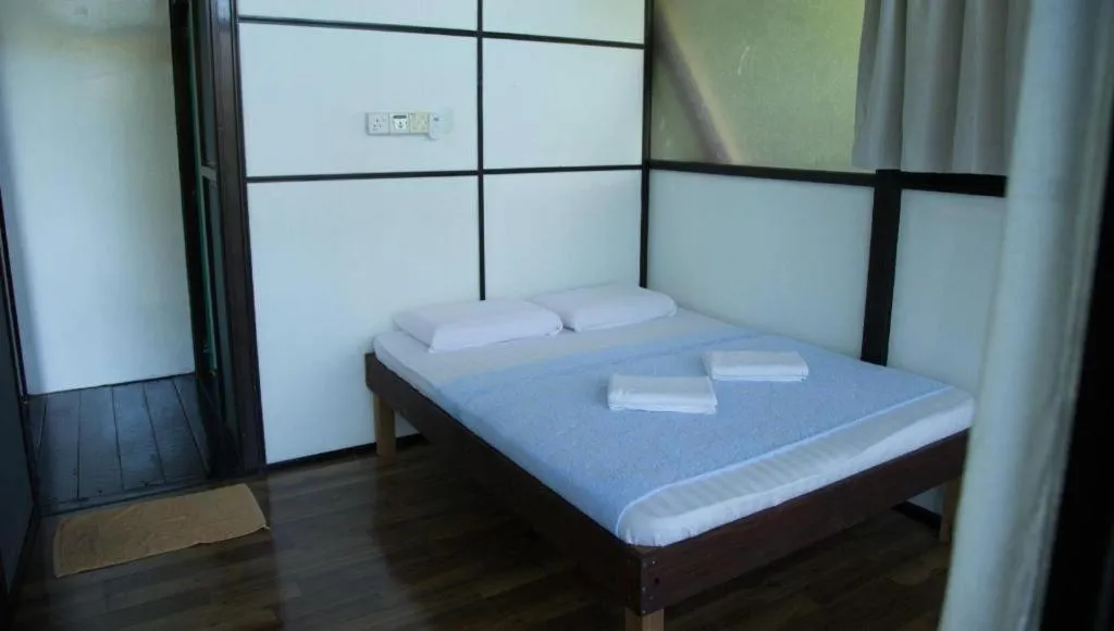 Bed in OYO 90980 Rainbow Island Sepanggar
