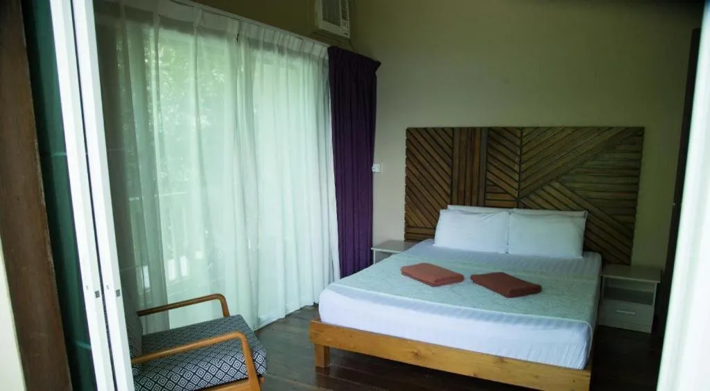 Bed in OYO 90980 Rainbow Island Sepanggar