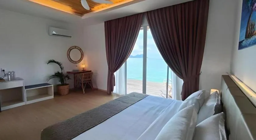 Bed in Sand Bay Resort Semporna